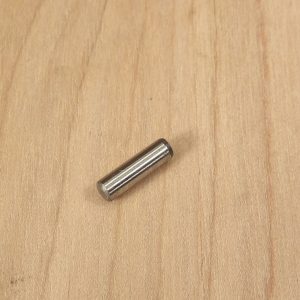 Inlet valve spring pin